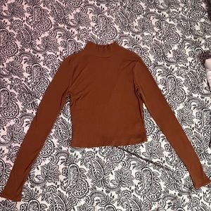 Cropped orangeish brown turtle neck